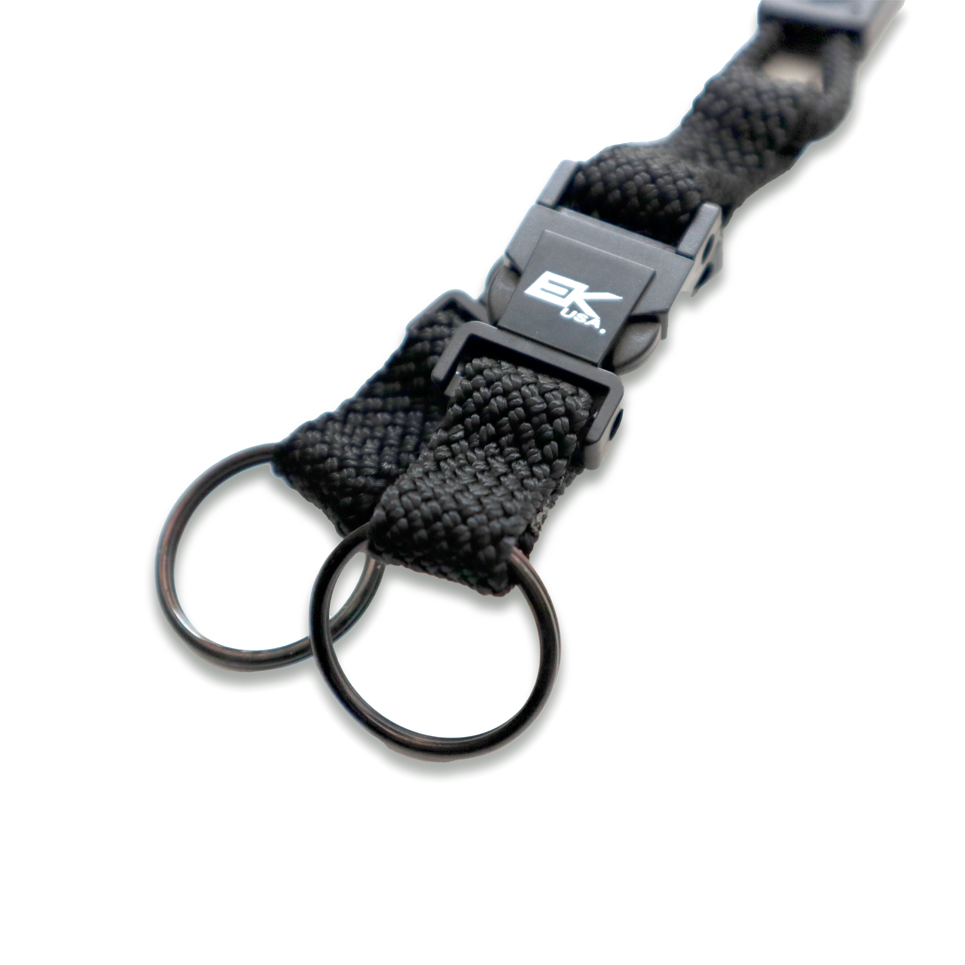 Close-up of an EK Black Lanyard by EK USA with two detachable key rings and a clasp, perfect for those seeking stylish key chain holders.