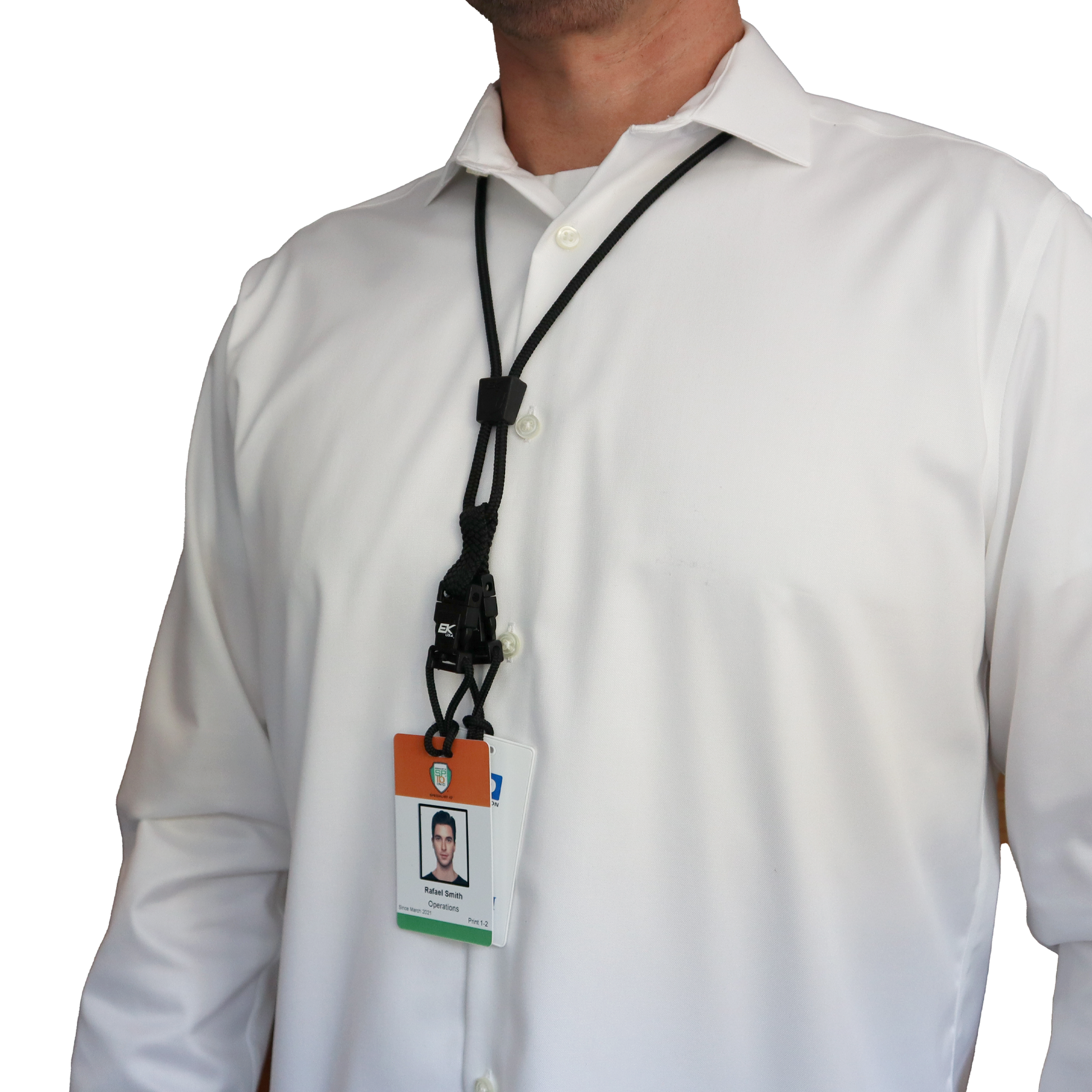 A person wearing a white shirt sported an ID badge on a Black EK Lanyard Plus II with Two Detachable Soft End Loops around their neck.