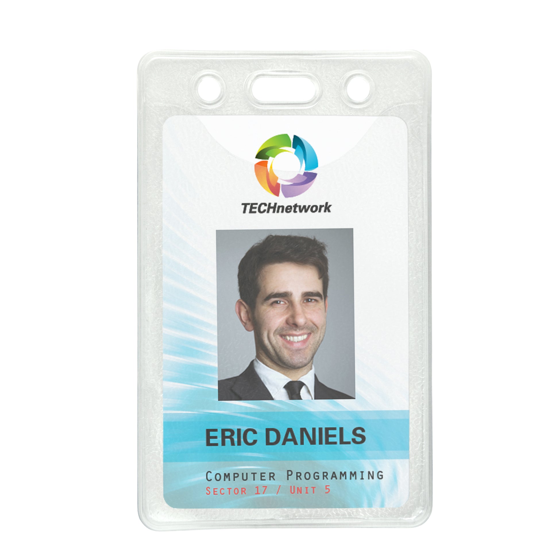 ID badge for Eric Daniels from TECHnetwork, Computer Programming, Sector 17, Unit 5, featuring a photo of a man in a suit and tie, housed in a Vertical Heavy Duty Vinyl ID Badge Holder with Reinforced Edges and Orange Peel Texture (1815-1100).