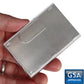 A hand holding a small rectangular metal object with a clear plastic edge and an RFID blocking GSA Approved logo in the lower right corner.