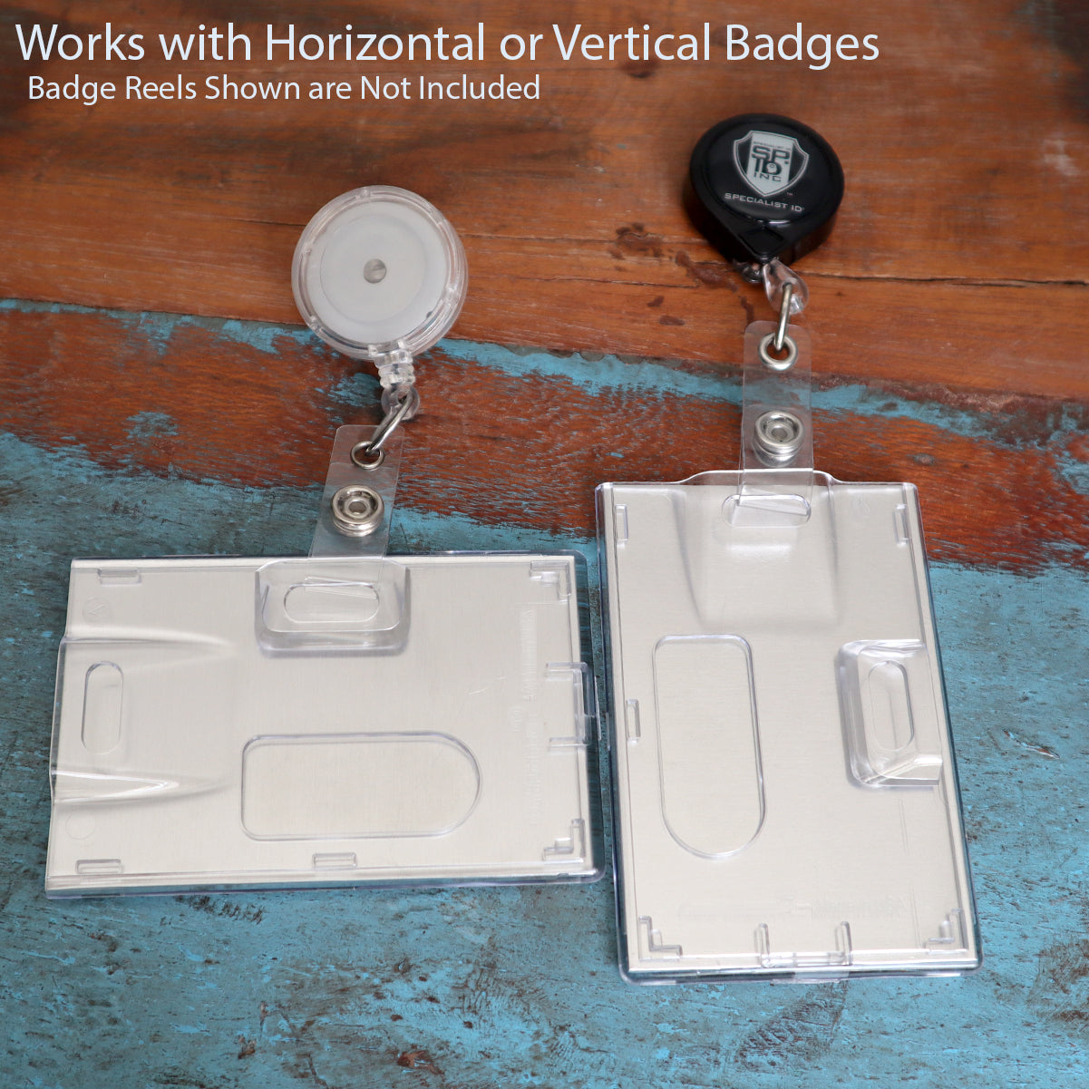 Two clear plastic badge holders, one vertical and one horizontal, are displayed on a wooden surface with badge reels attached. Text above reads: "Works with Horizontal or Vertical Badges. Badge Reels Shown are Not Included." Great for identity theft prevention.

Rigid Shielded RFID Blocking 2-Card Holder (FIPS 201 Approved) 1840-5081