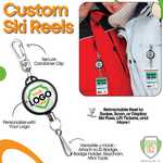 A promotional image for the Custom Retractable Ski Pass Holder - Heavy Duty Sport Reel (2120-4101). This product features a retractable reel with a secure carabiner clip, J-hook, and ample space to personalize with your logo. Ideal for enhancing brand visibility while displaying and swiping ski passes.