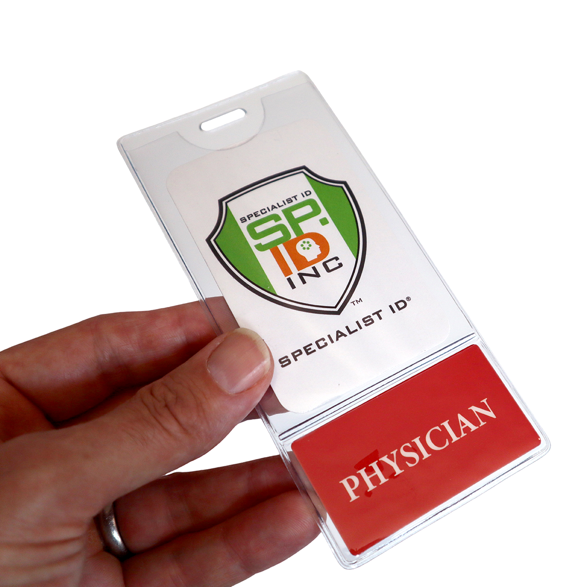 A hand holds a clear badge holder displaying a "Specialist ID" logo at the top and a red card with the word "PHYSICIAN" at the bottom. These PHYSICIAN BadgeBottom Badge Holder & Badge Buddy IN ONE!! - Vertical ID Badge Sleeve with Bottom Role Tag for Doctors are perfect for customizable titles like Physician, ensuring easy identification.