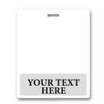 A blank white identification badge with a rectangular gray section at the bottom containing the text "YOUR TEXT HERE" in bold, black letters. This Oversized Custom Printed Horizontal XL Badge Buddy (Extra Large Size) enhances ID badge recognition, making it ideal for any event or workplace.