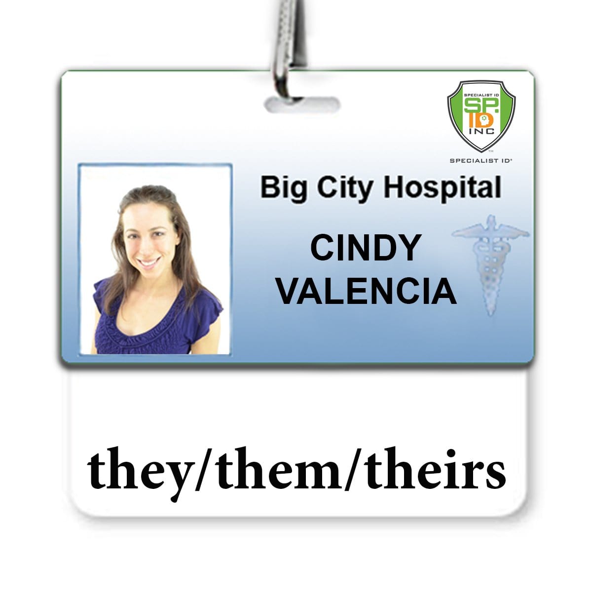 An identification badge of Cindy Valencia from Big City Hospital, displaying the gender-neutral pronouns "they/them/theirs" on a white background. This Pronouns Badge Buddy They/Them/Theirs Gender Neutral - Horizontal with White Border emphasizes diversity and inclusion in a professional setting.