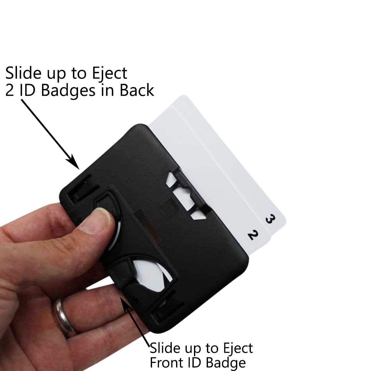 A hand holding the Specialist ID Horizontal 3 Card Badge Holder & Heavy Duty Lanyard with Breakaway Clip and Key Ring - Hard Plastic Rigid Name Tag Protector -Top Load for Three Badges with a thumb sliding a lever to eject one of the two white cards from the back. Text instructions in the image indicate how to eject the front and back cards, making it perfect for professional work wear.
